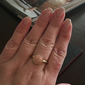 Ring with light pink stone